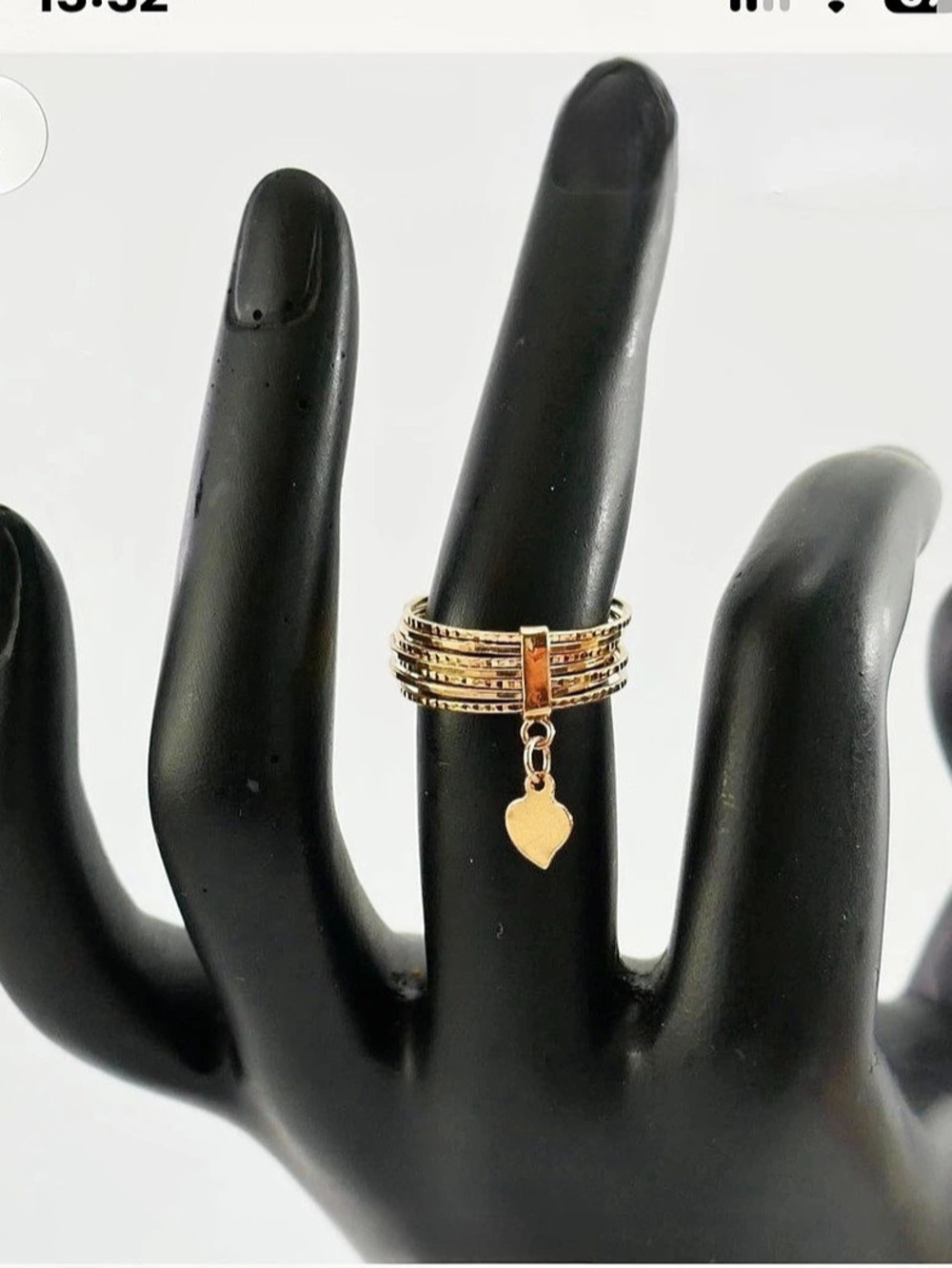 This 10K ring This 10-karat gold weekly multi-ring ring stands out in particular